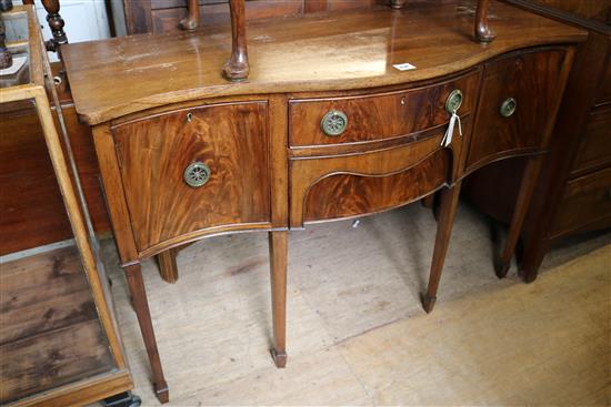 Georgian style mahogany serpentine sideboard